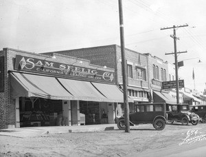 View of a Commercial street in Tujunga, showing Sam Seelig's grocery and the Tujunga Drug Company