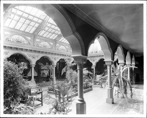 Interior view of atrium inside of the Gail Borden Jr. residence in Alhambra, shown at an angle, ca.1902-1908