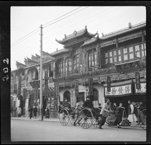 "Jinrikishaw", showing two western men being pulled in rickshaws, Shanghai, ca.1900