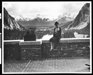 Woman sitting on a wall, Canada, ca.1930-1939