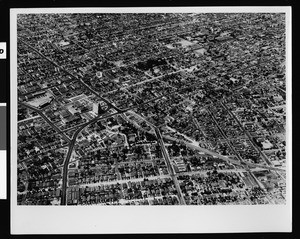 Aerial view of Los Angeles, looking northwest at the intersection of Rosewood Avenue and Madison Avenue, 1939