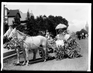 Horse-drawn wagon decorated with flowers for La Fiesta de Los Angeles