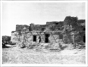 Construction of an addition to a native dwelling in a Hopi pueblo, ca.1900