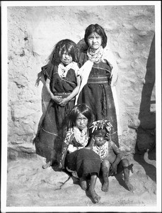 Hopi children from a well-to-do family waiting for the Snake Dance at the pueblo of Walpi, Arizona, ca.1898