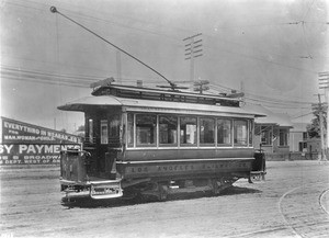 One of the first successful types of streetcar used on the Second Street hill by the Los Angeles Railway Company at Central Avenue and Sixth Street looking west, West Lake Park, ca.1891