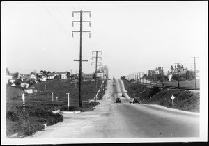 View of Big Santa Monica Boulevard looking east from Pandora Avenue before widening and paving, January 31, 1935