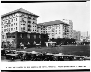 Exterior view of the Hotel Virginia in Long Beach shown from the parking lot, ca.1925