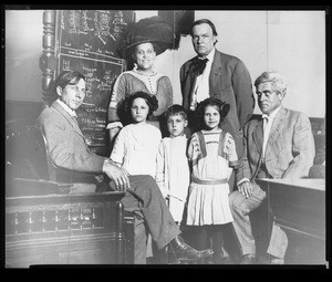 Mrs. Ortie McManigal with Clarence Darrow, Job Handiman, and J. Scott, 1910-1919