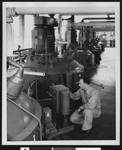 Shell Oil Company employee at work, ca.1940