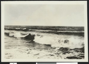 View of waves breaking near shallows