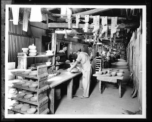 Interior view of the jigger room at the Pacific Clay Products factory in Los Angeles, 1934