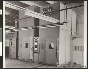 Plumbing and heating equipment inside an unknown plant, ca.1930