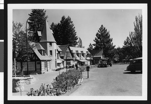 Exterior view of shops next to a street, Lake Arrowhead, ca.1950