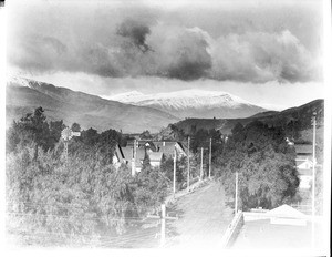 Panoramic view of Santa Paula, showing snow-covered Topa Topa Mountains in the background, ca.1905
