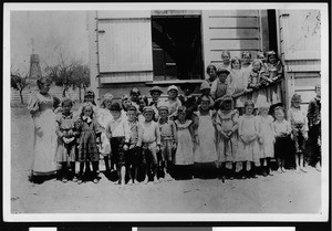 Group portrait of students of the Cahuenga Township School and their teacher