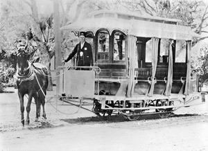 Horse-drawn streetcar for the Redondo Depot Car Line with its driver, ca.1897