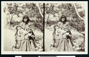 Walapai indian woman holding a baby