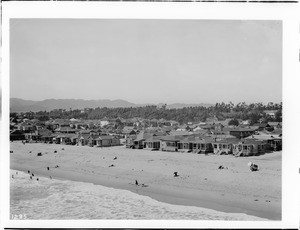 Small beach homes crowded on the beach, looking north from the pier, ca.1900
