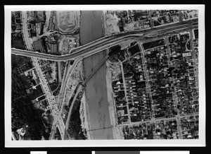 Aerial view of Hyperion Viaduct over Riverside Drive and the Hyperion Bridge over flooding Los Angeles River, 1938