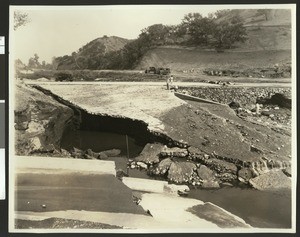 Flood damage on a road, ca.1930