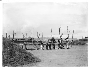 Laguna Indians threshing and winnowing wheat at the pueblo town of Paquate, New Mexico, ca.1900