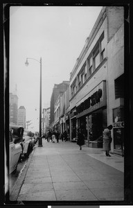 Commercial sidewalk on the 6400 block of Hollywood Boulevard looking toward Cahuenga Boulevard, 1950-1959