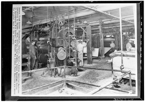 Rubber calendar machines operating in tandem at a Samson Tire and Rubber Corporation plant, Compton