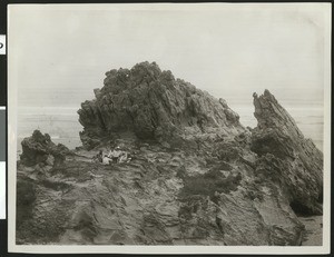 Group having a picnic near a rock formation at Casa del Mar