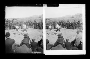 Stereograph of two American boxers fighting in an outdoor ring in Juarez, Mexico, ca.1900-1905