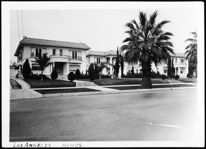 Row of two-story homes along an unidentified street in Los Angeles