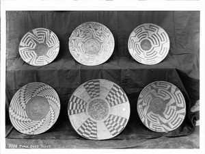 Collection of Pima Indian baskets (food trays), ca.1900