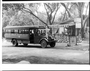 Exterior view of Rice's Restaurant in Tujunga, showing a parked bus