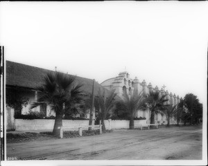 Exterior view of the south side of Mission San Gabriel, 1900