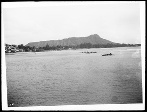 Racing outriggers (native surfboats) at Waikiki Beach, Honolulu, Hawaii, 1898