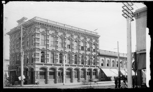 Exterior view of the County Bank building on the Temple block, looking south from Temple Street on Spring Street, ca.1888-1890