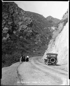 View of a car and people on an unidentified road in Topanga Canyon, ca.1915