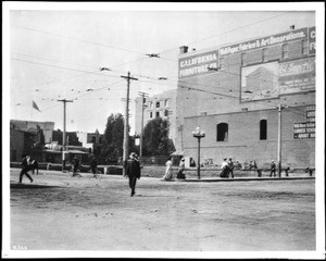 Broadway at the corner of Seventh Street showing a building advertising for the California Furniture Company, Los Angeles, ca.1906