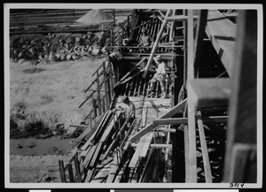 Men on scaffolding during storm drain construction