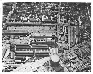 Aerial view of Los Angeles north on Seventh Street from Alameda Street, showing the public market, ca.1928