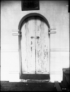 Mission doorway with "River of Life" design at Mission Santa Inez (?), ca.1900