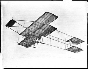 Louis Paulhan making his record flight, flying at 4,600 feet, in his Henry Farman biplane, Dominguez Field, Los Angeles, January 12, 1910