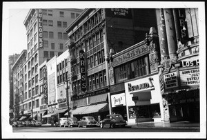 View of the west side of Broadway, looking south from the Los Angeles Theater at Sixth Street, ca.1940-1949