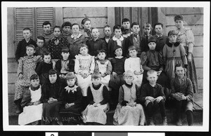 A group portrait of students and their teacher of La Dow School, 1894