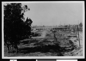 View looking west on Ramona Boulevard right of way, before street existed, from the State Street Bridge, November 30, 1933