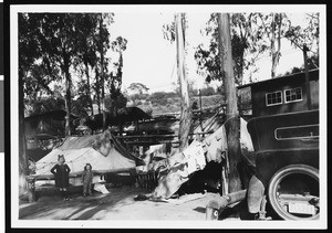 Children in an automobile camp under eucalyptus trees at the Los Angeles Municipal Camp Grounds, Elysian Park, January 1923
