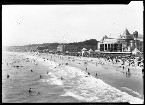 Beachgoers in front of the Deauville Club on the beach in Santa Monica, ca.1923