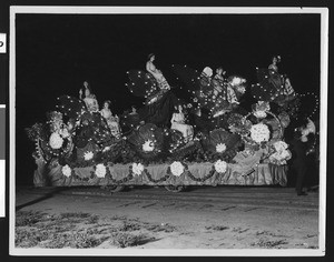 Float in Shriner's electrical parade, depicting fireflies, ca.1910