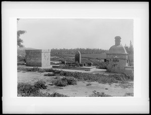 Chinese grave markers with altar in a cemetery, ca.1900