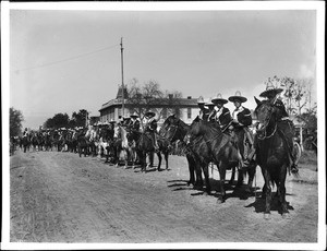 Mexican caballeros lined up for La Fiesta de Los Angeles in, 1903