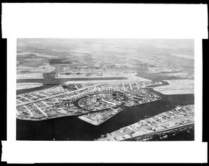 Aerial view of the Naples area of Long Beach, showing the Pacific Electric Railroad and the state highway, 1915